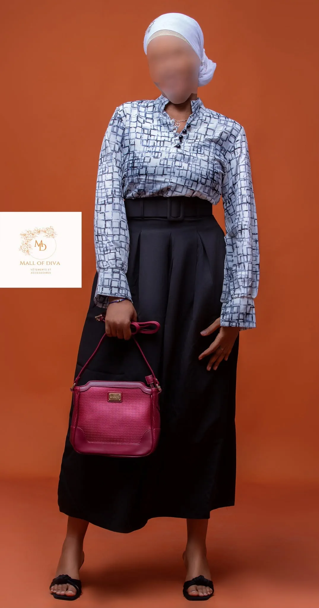 Silhouette de mode avec sac sur fond orange.